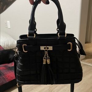 Black Quilted Tassel Top-Handle Bag